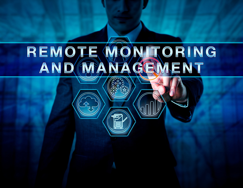 manager pressing remote monitoring and management